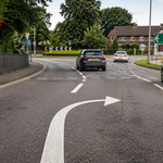 curved arrow road marking mean